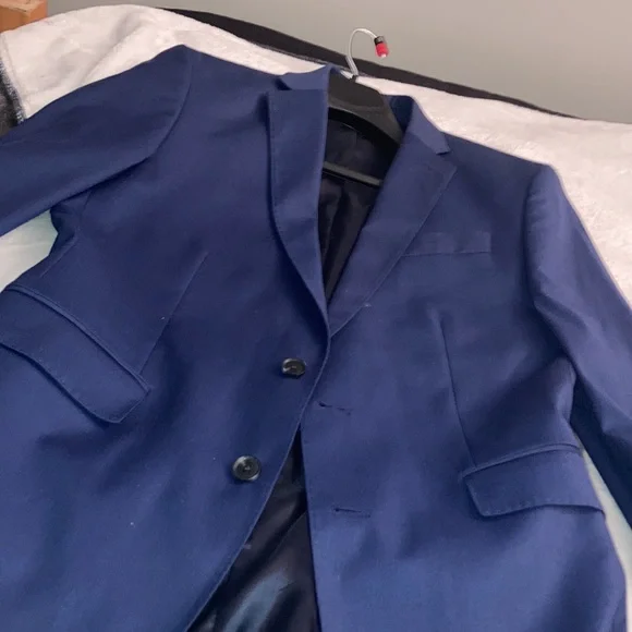 Navy blue men’s suit.